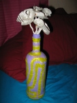 "Newsprint Vase and Flowers"